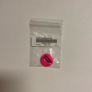 Supreme button/pin